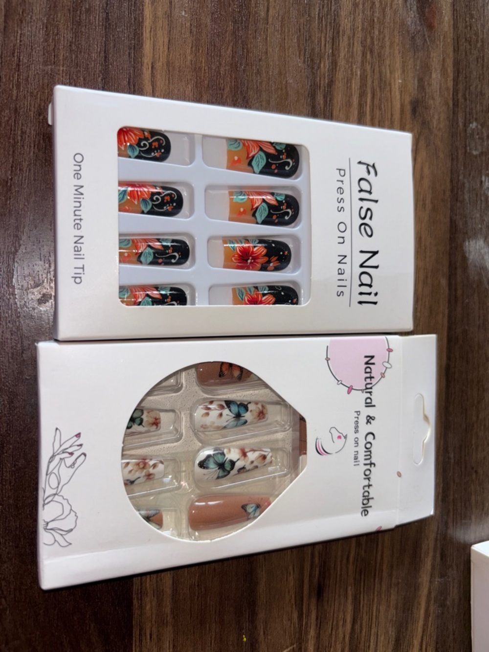 False Nail Floral Press-On Set in Black, Orange, Teal and Nude